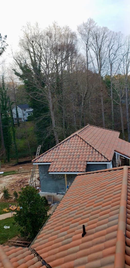 High angle view of Spanish clay tile roof sections and ridge layout